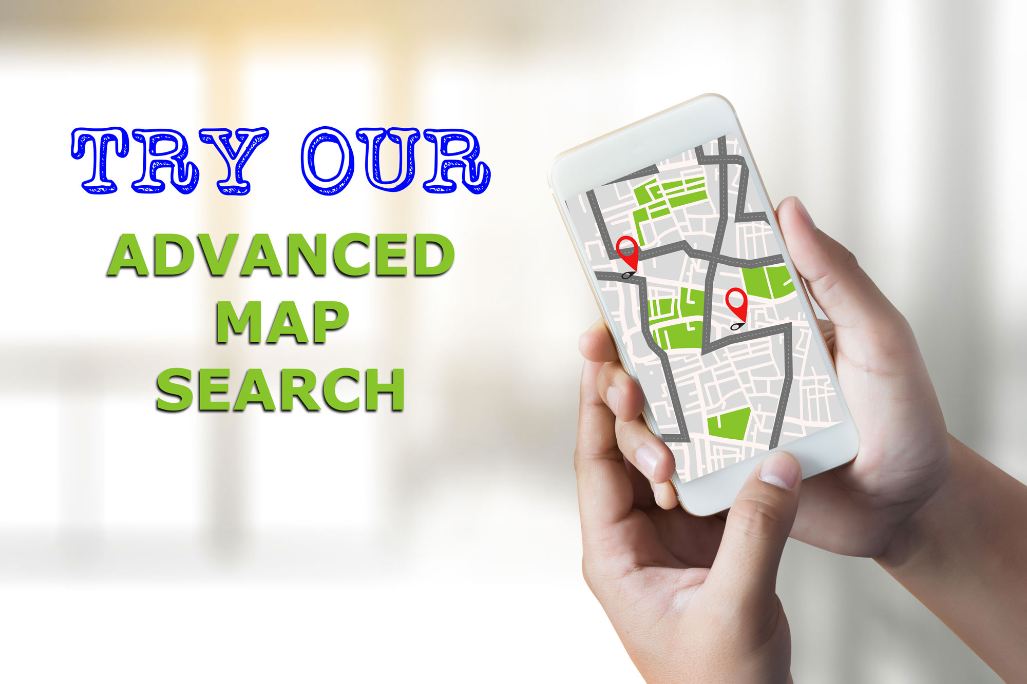 Hand holding mobile phone with map and text Try Our Advanced Map Search